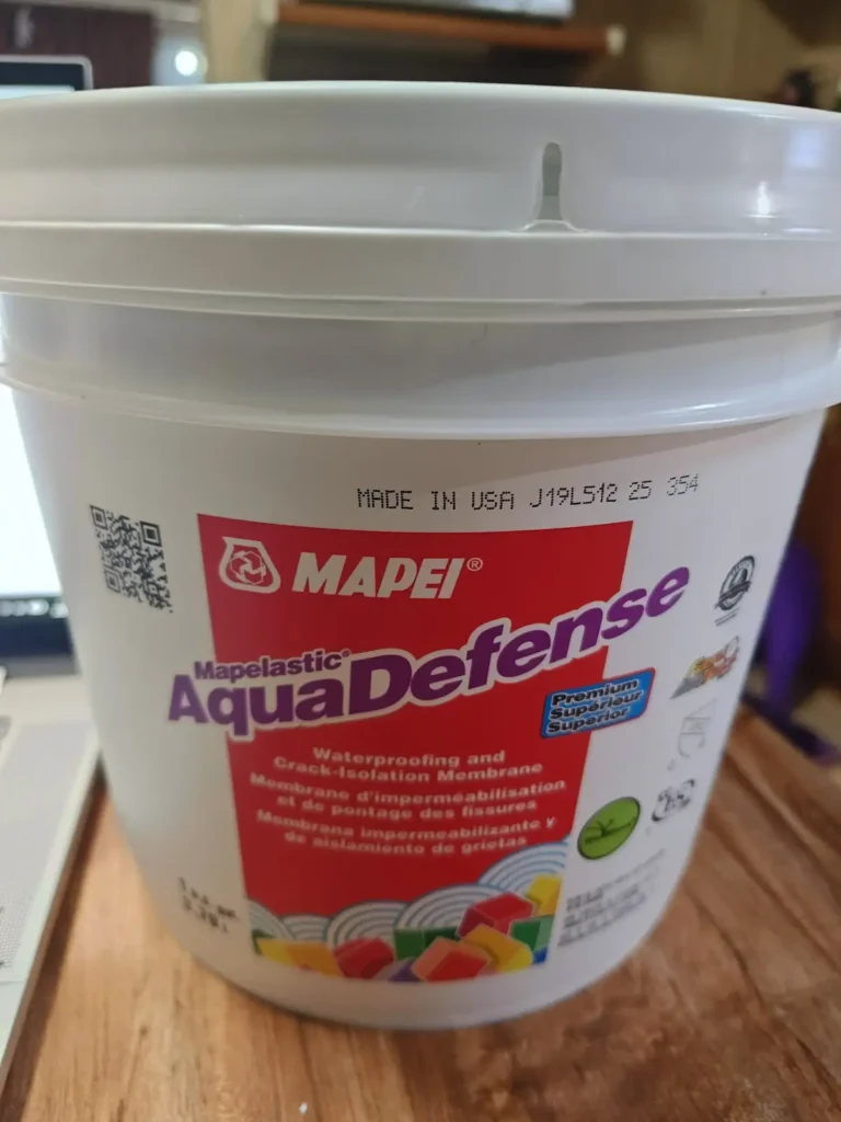 Mapei AquaDefense waterproofing membrane for senior bathroom backerboard installation